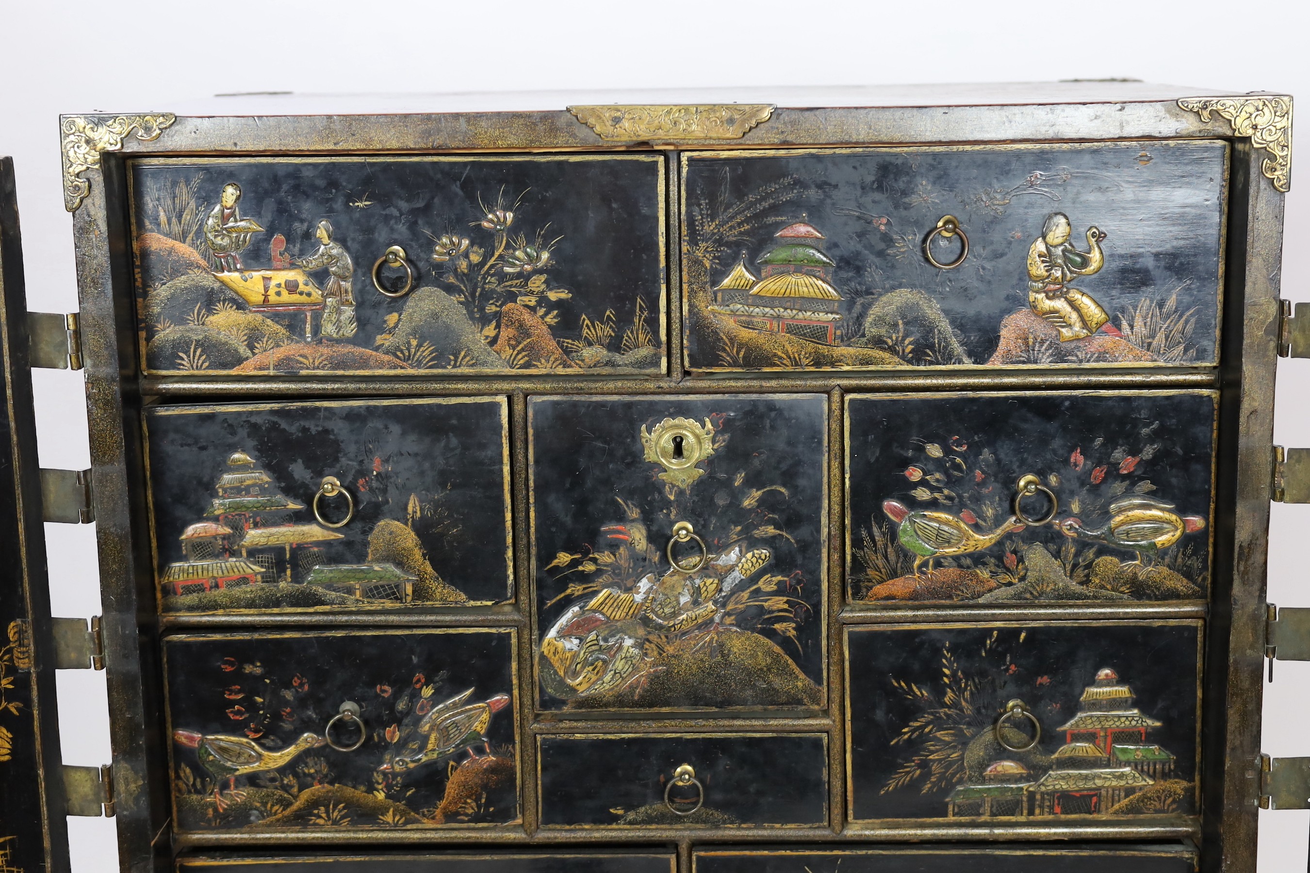 A William & Mary black japanned cabinet on stand, W.96cm D.61cm H. overall 149cm